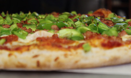 cooked pizzza with green peppers 4